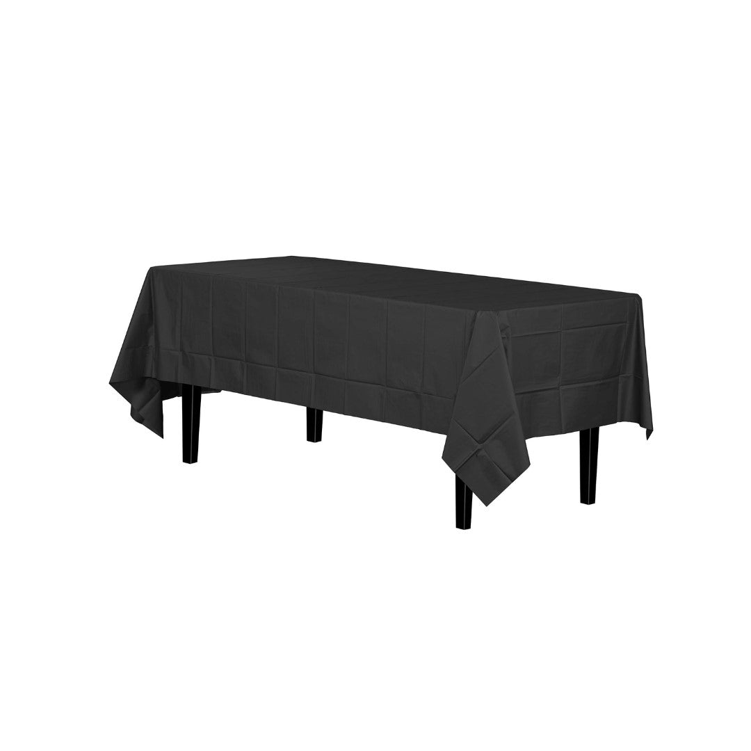 A black rectangular tablecloth draped over a table with four legs, shown against a plain white background.